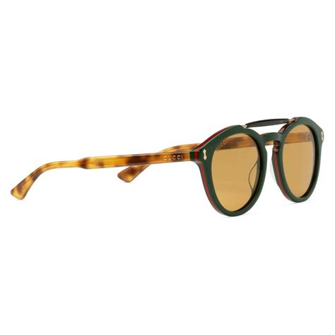 occhiali gucci verde fluo|Occhiali da sole rotondi in tartarugato e acetato verde .